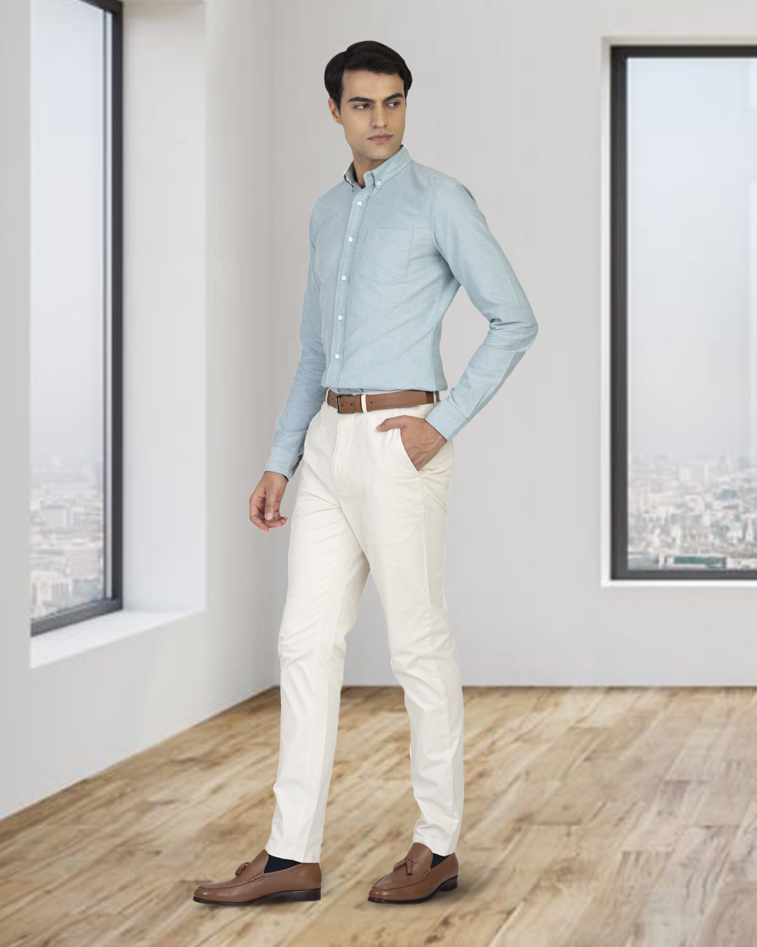 Model wearing custom Genoa Chino pants for men by Luxire in ivory cream hand in pocket