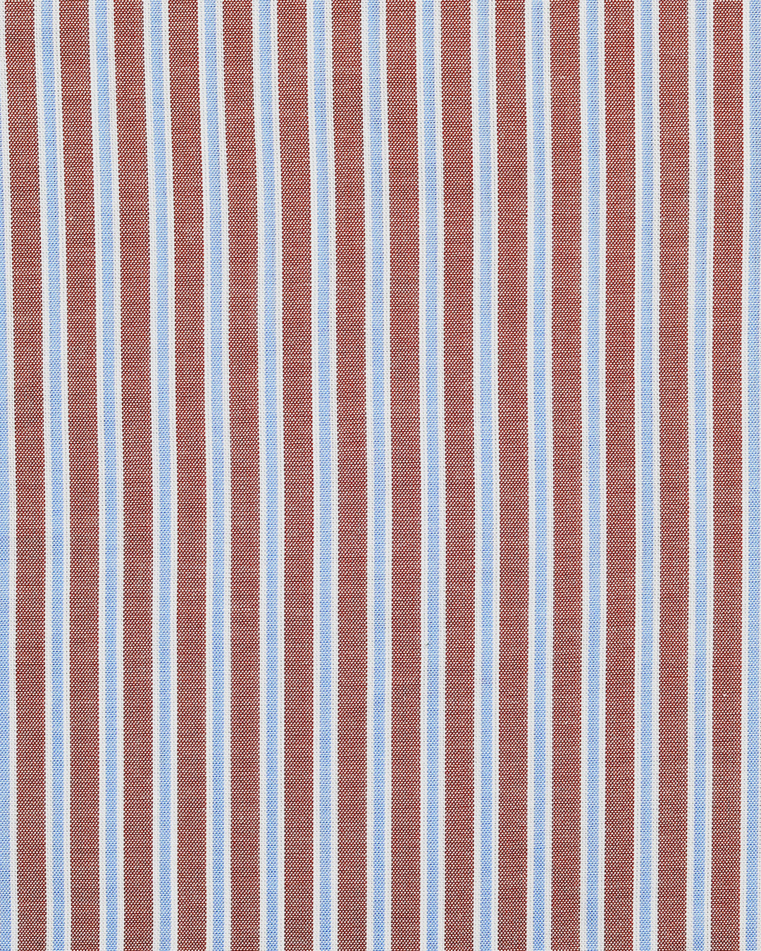 Close up of the custom oxford shirt for men by Luxire with blue white and rust stripes