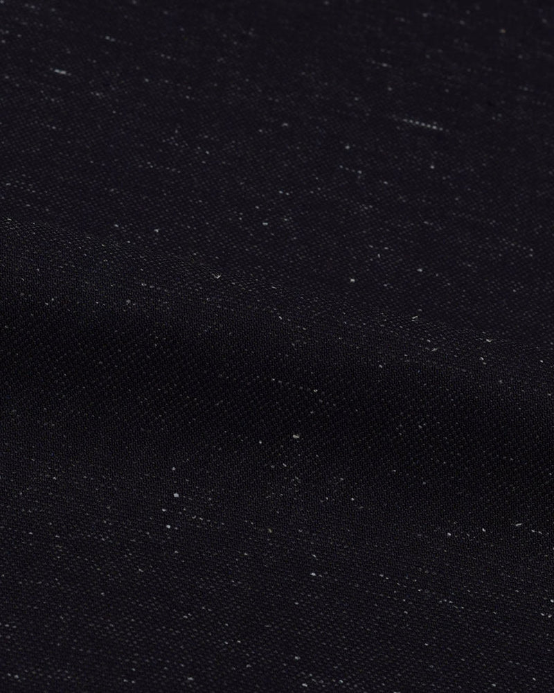 Close up view of slub jeans for men by Luxire in navy