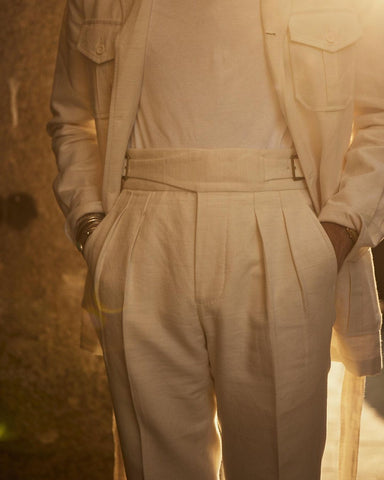Front view custom linen Gurkha pants for men by Luxire in off white