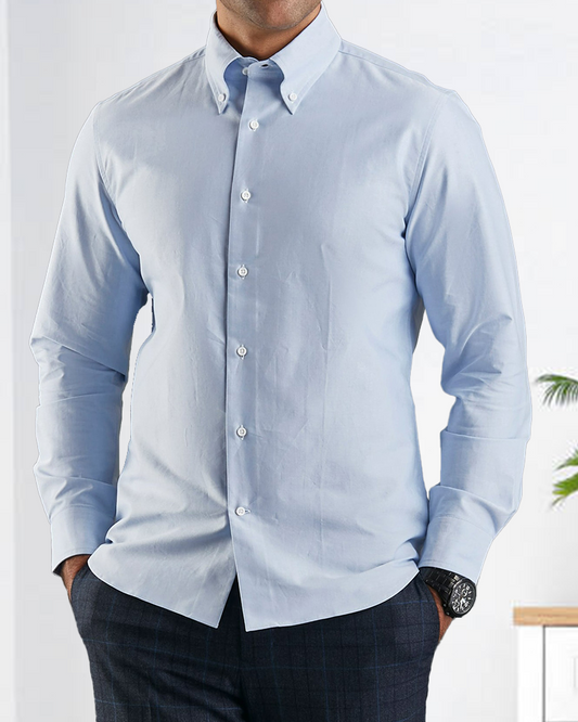 Model wearing the custom oxford shirt for men by Luxire in sky blue