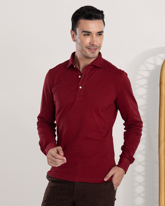 Model wearing the custom oxford polo shirt for men by Luxire in maroon